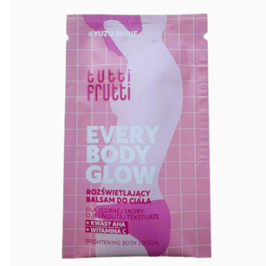 TUTTI FRUTTI EVERYBODY GLOW švytėjimo suteikiantis kūno balzamas #YuzuShine su AHA rūgštimis ir vitaminu C,7 g (MĖGINUKAS)